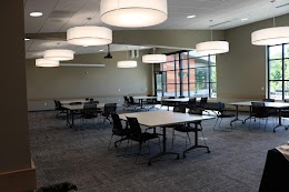 Image of Gathering Place A & B set up with tables in quads