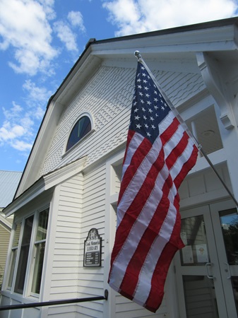 photo of new U.S. flag hung outside the Cook Memorial Library