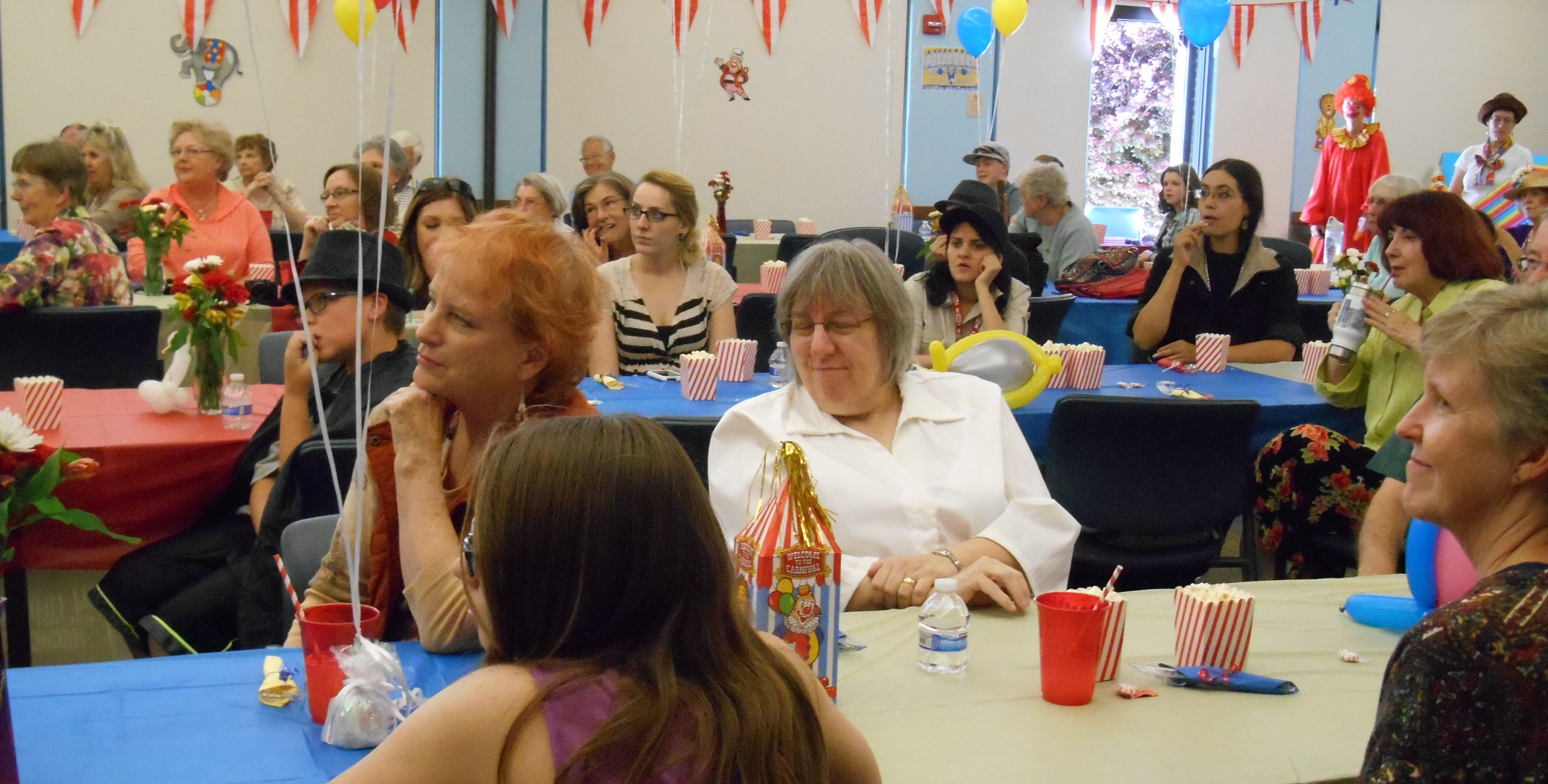 Library staff and volunteers clowning around at the 2015 library volunteer appreciation event.
