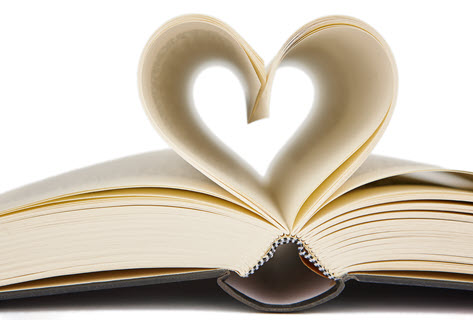 open book with pages making a heart