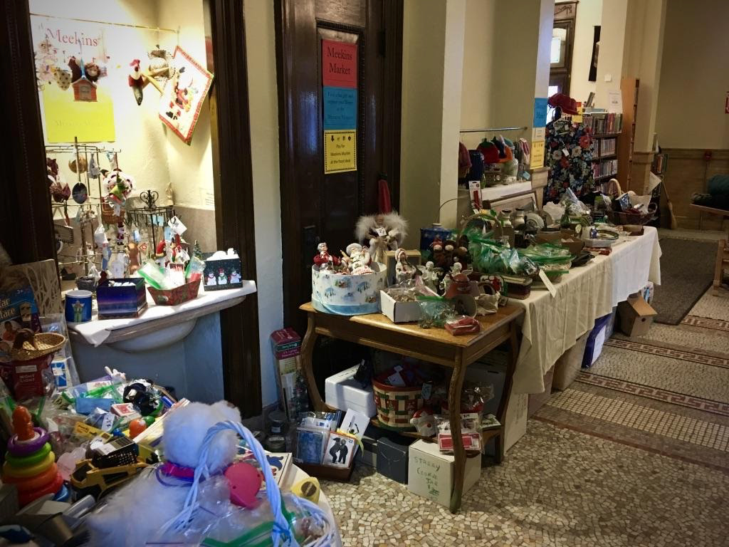 Tables covered with toys and Christmas decorations