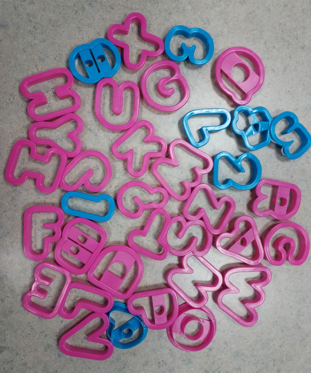 Image of letters and numbers shaped cookie cutters