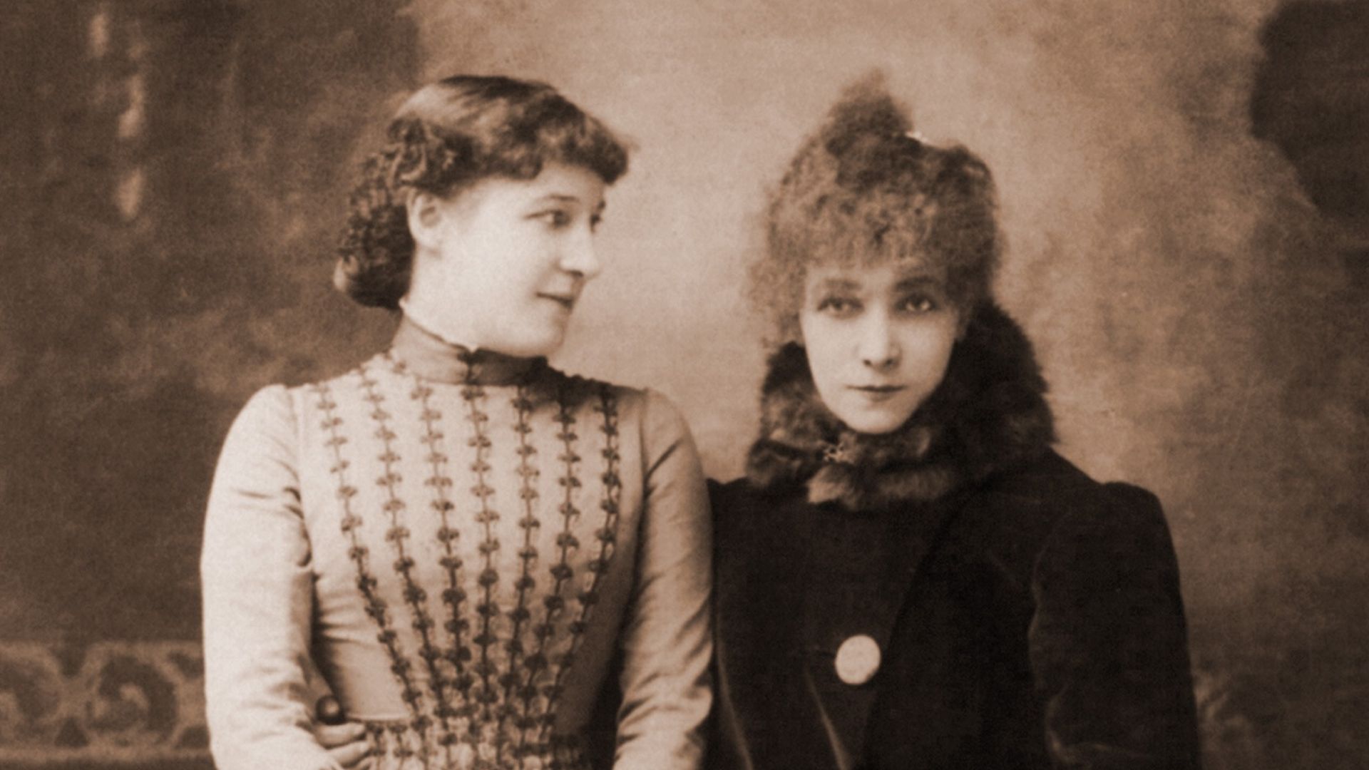 Sepia-tone picture of two women from the 1900's