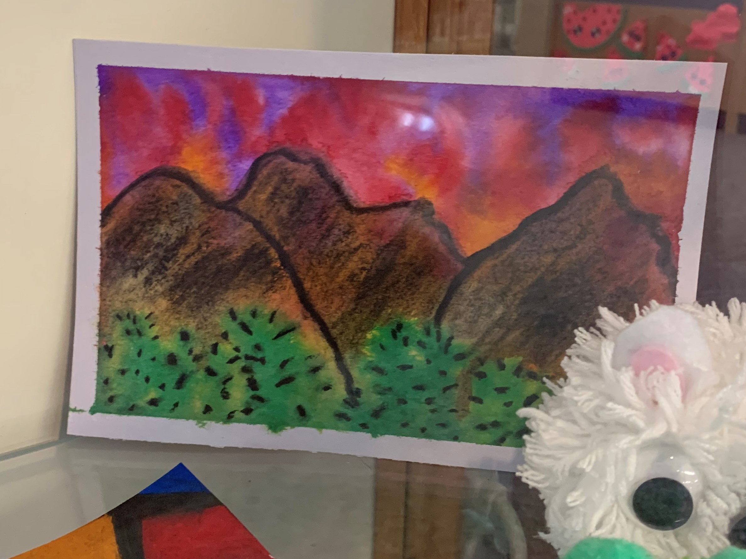 painting of mountains and sunset 