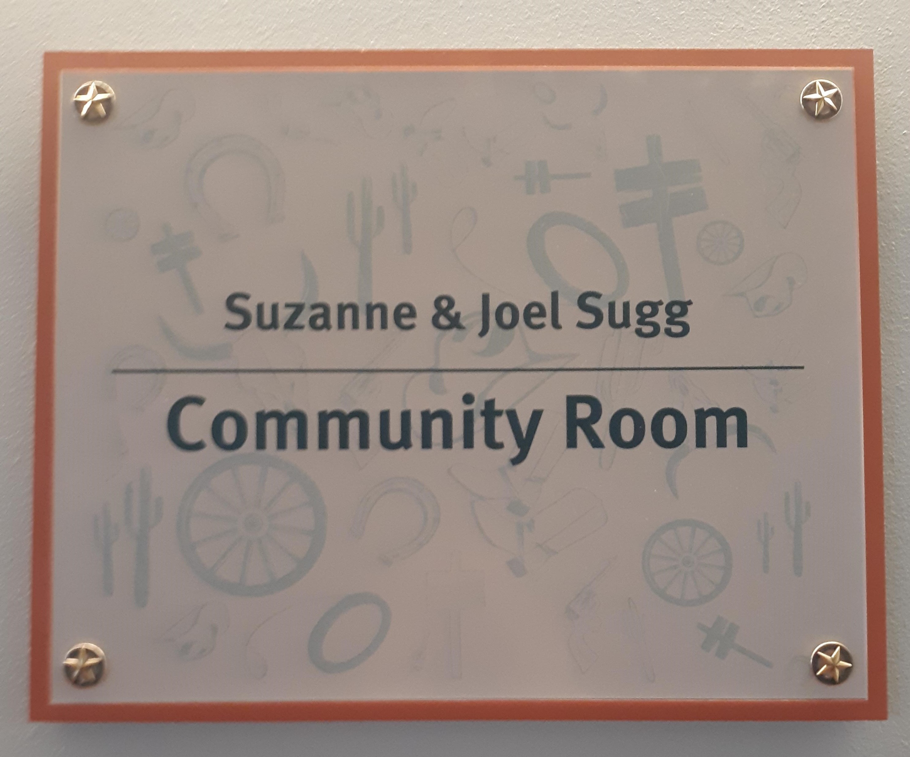 Suzanne and Joel Sugg Community Room name plate