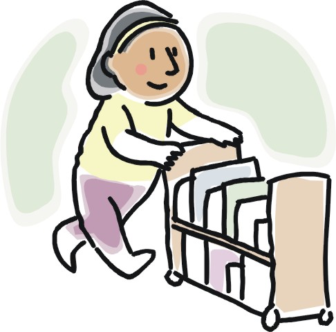 Smiling person pushing a cart of books