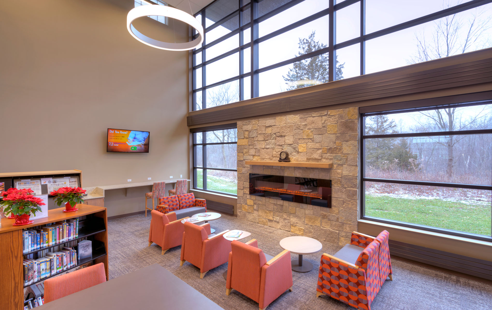 Image of the interior of white lake library showing the Mix seating area and fireplace
